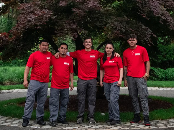 Smooth Move crew in front of a moving truck